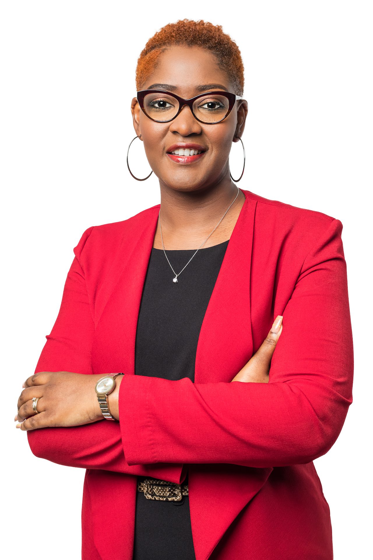portrait of corporate Jamaican woman wearing glasses taken by Gabre Cameron